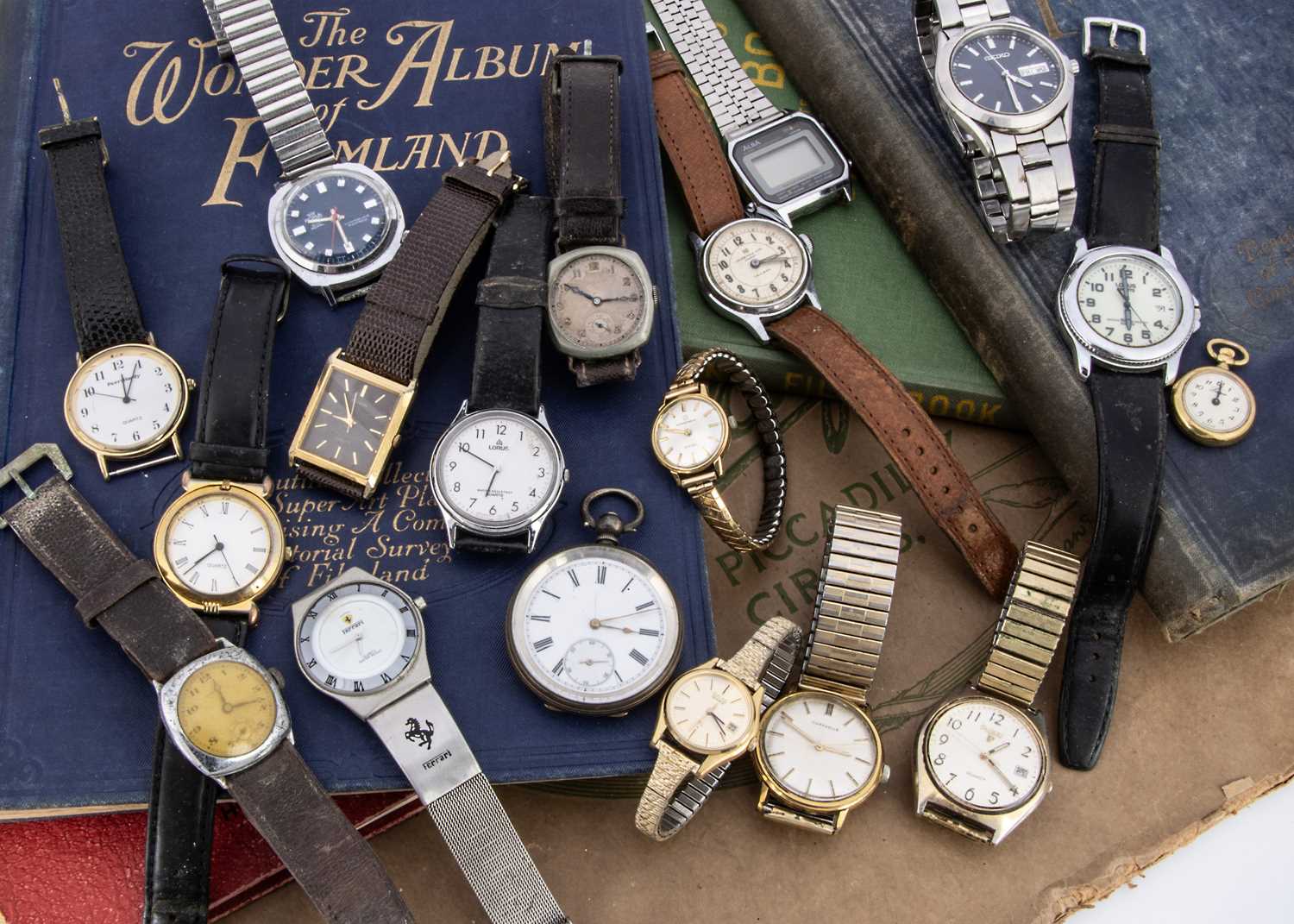 A group of modern and vintage watches,