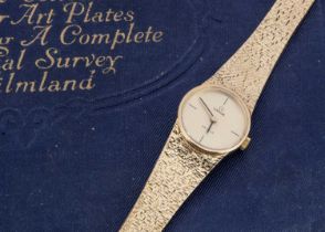 An Omega manual wind 9ct gold lady's wristwatch,