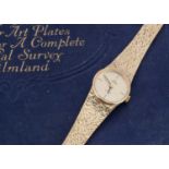 An Omega manual wind 9ct gold lady's wristwatch,