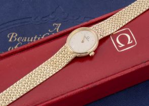 A modern 9ct gold Omega quartz ladies wristwatch,