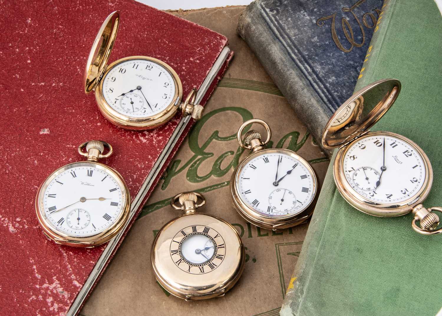 Five first half 20th century gold pocket watches,