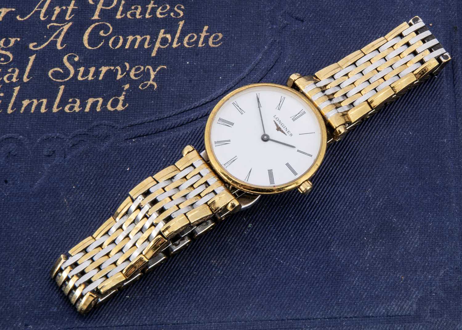 A modern Longines Le Grande Classique stainless steel and gilt quartz lady's wristwatch,