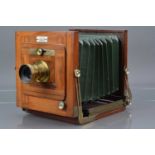 A Mahogany and Brass Tailboard Camera,