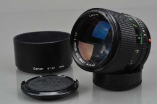 A Canon FD 85mm f/1.8 Lens,