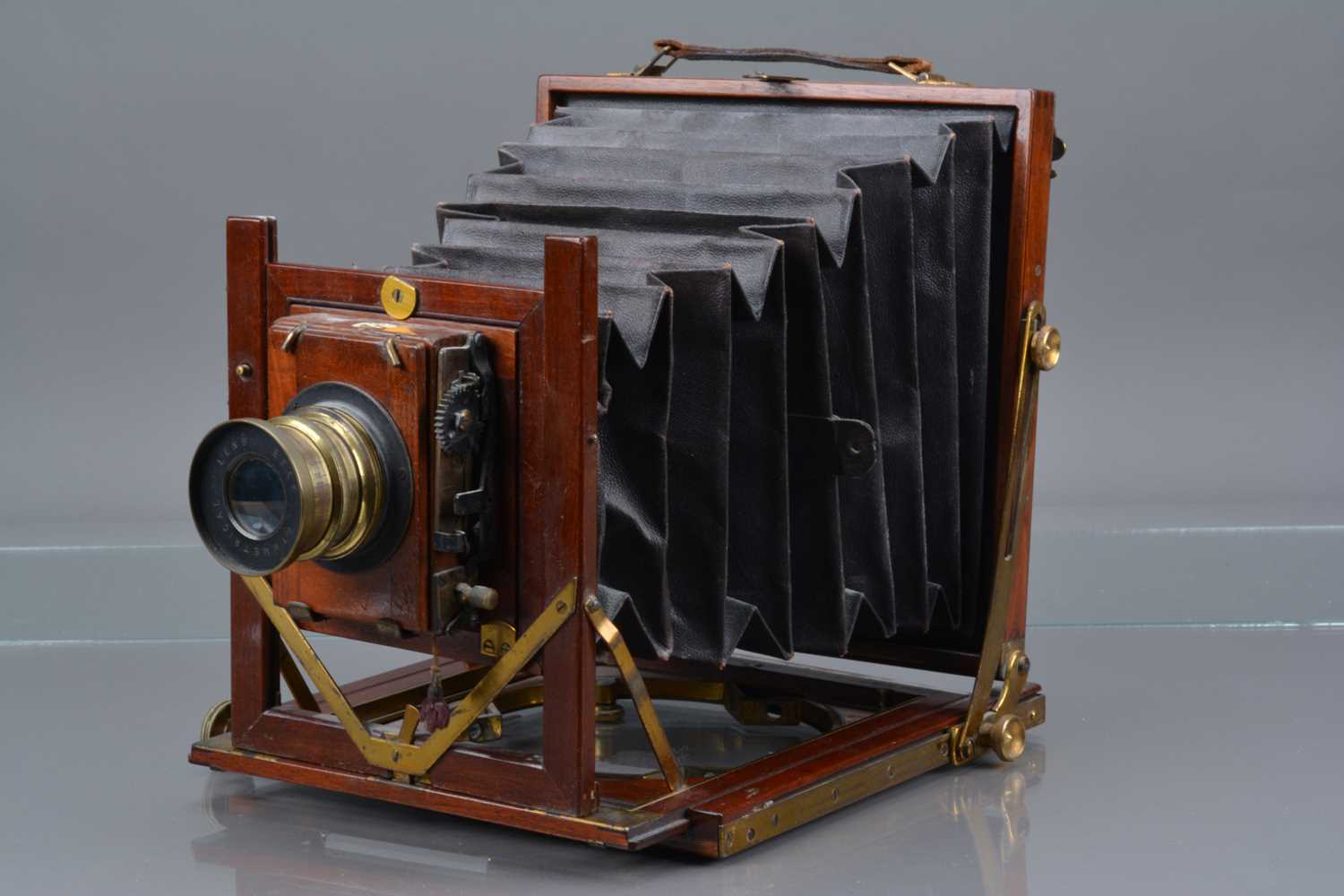 A Mahogany and Brass Half Plate Camera