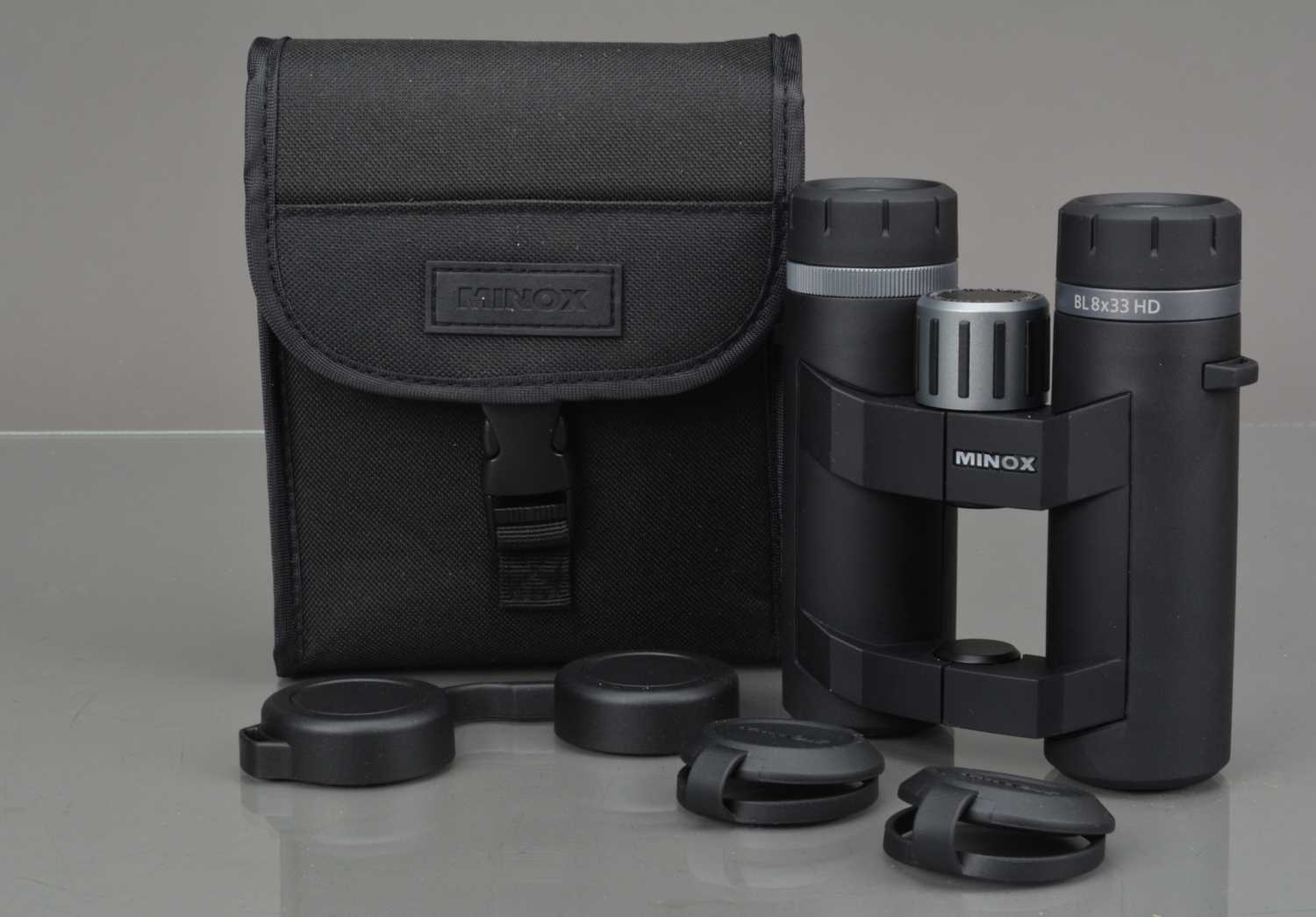 A Pair of Minox BL 8x33 HD Binoculars,