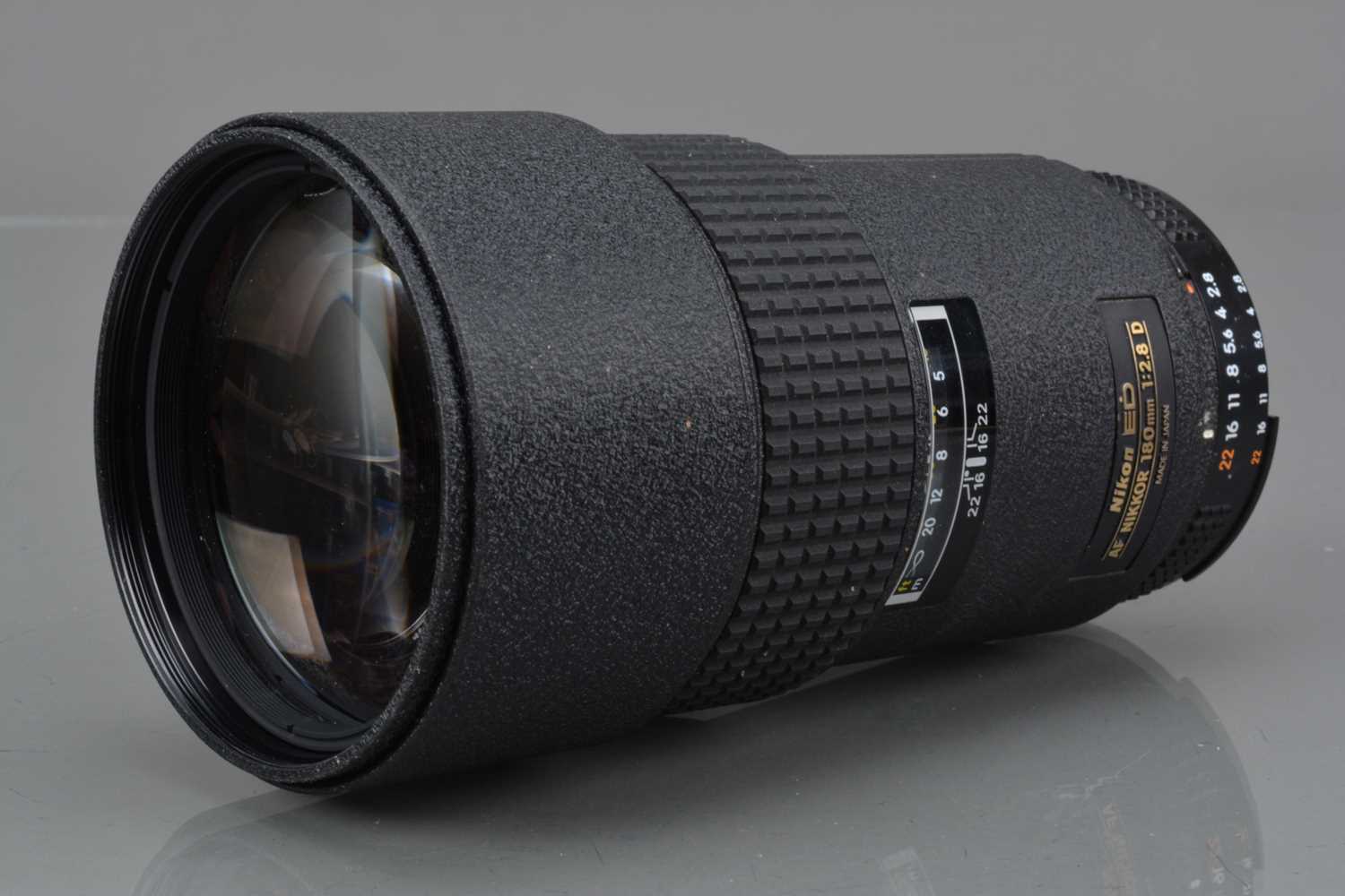 A Nikon ED AF Nikkor 180mm f/2.8D Lens,