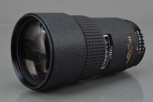 A Nikon ED AF Nikkor 180mm f/2.8D Lens,