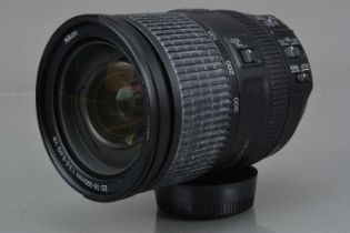A Nikon DX AF-S Nikkor 18-300mm f/3.5-5.6G ED VR Lens,