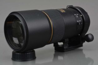 A Nikon ED AF-S Nikkor 300mm f/4D Lens,