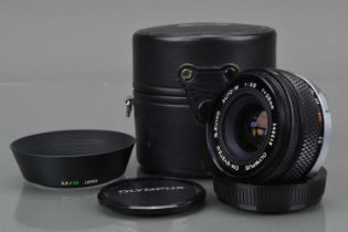 An Olympus OM G. Zuiko 28mm f/3.5 Lens,