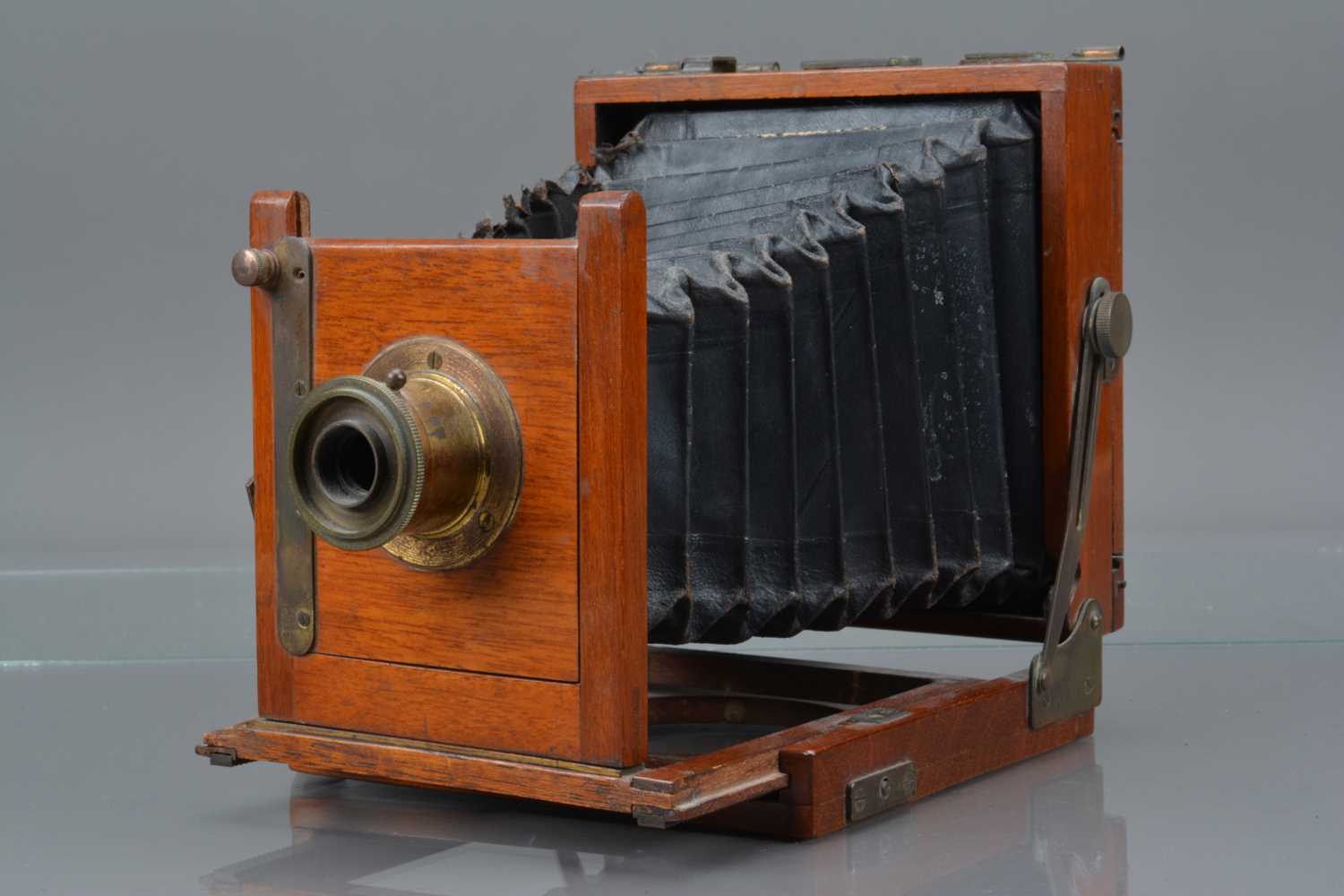 A Mahogany and Brass Quarter Plate Camera,