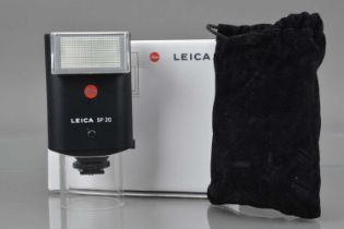 A Leica SF 20 Flash unit,