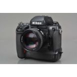 A Nikon F5 SLR Camera,