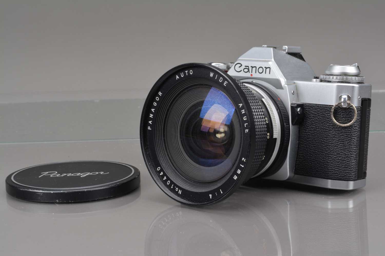 A Canon AV-1 SLR Camera,