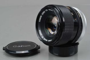 A Canon FD 100mm f/2.8 S.S.C. Lens,