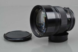 A Canon FD 135mm f/2 Lens,