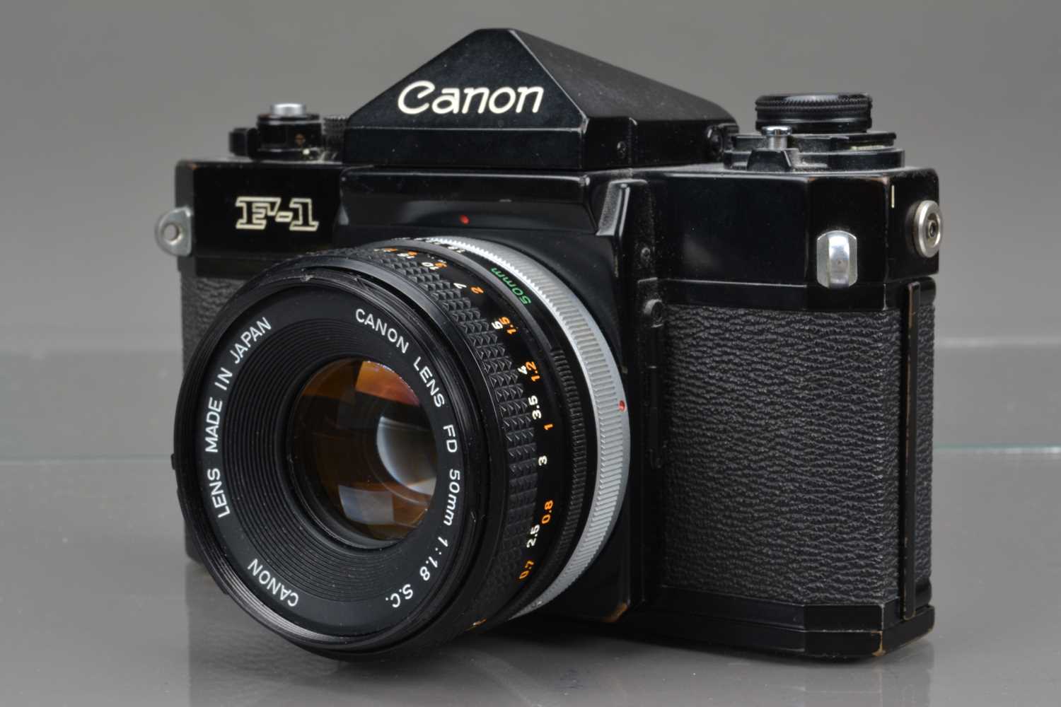 A Canon F-1 SLR Camera,