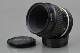 A Nikon Micro Nikkor 55mm f/2.8 Ai-S lens,