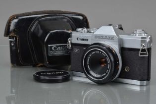 A Canon Pellix QL SLR Camera,