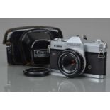 A Canon Pellix QL SLR Camera,