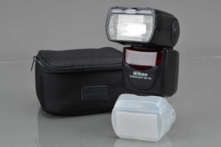 A Nikon Speedlight SB-700 Flash Unit,