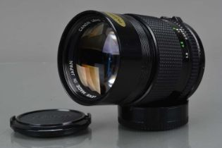 A Canon FD 135mm f/2.8 Lens,