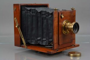 An E & T Underwood Mahogany & Brass Half Plate Camera,