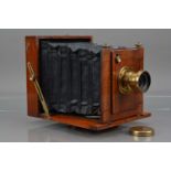 An E & T Underwood Mahogany & Brass Half Plate Camera,