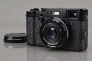 A Fujifilm X100 F Digital Camera,
