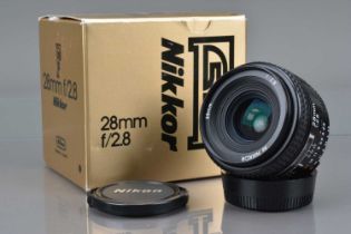 A Nikon AF Nikkor 28mm f/2.8 Lens,