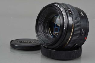 A Canon EF 50mm f/1.4 Ultrasonic Lens,