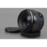 A Canon EF 50mm f/1.4 Ultrasonic Lens,