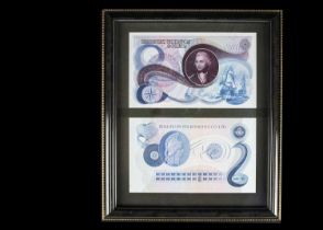 A Framed pair of Bradbury Wilkinson advertising banknotes,