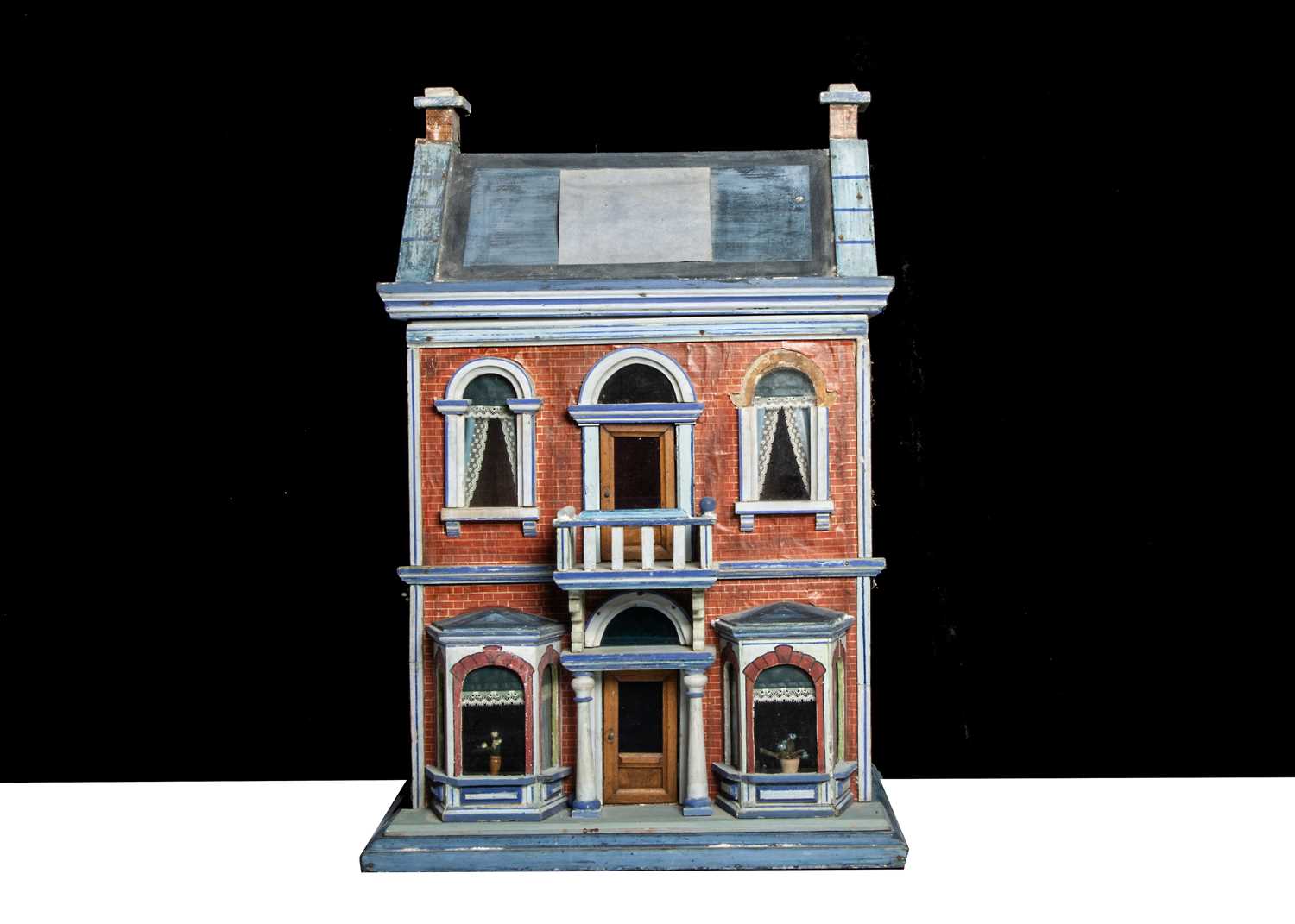 A Gottschalk wooden blue roof dolls’ house,