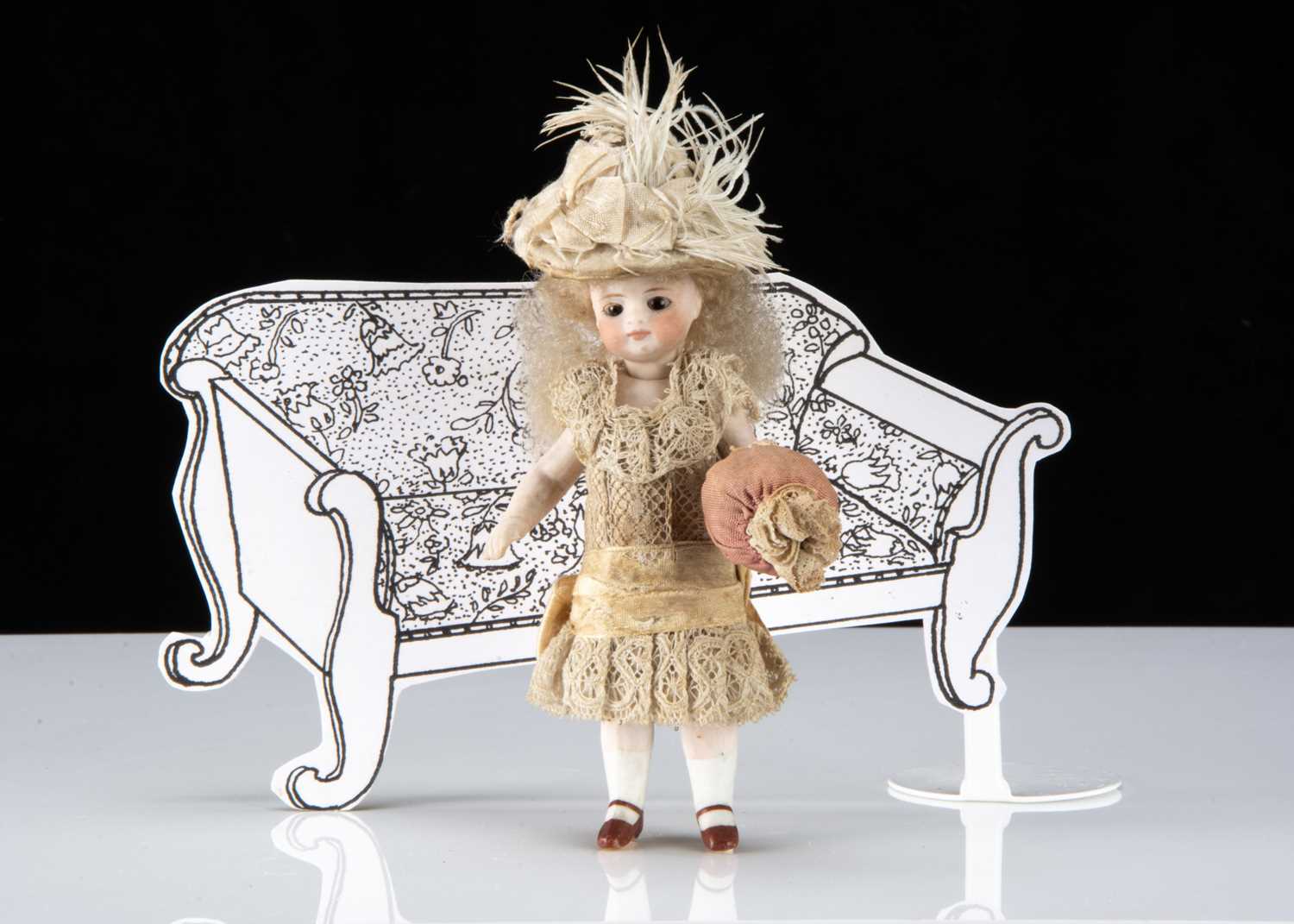 A fine Simon & Halbig Mignonette all-bisque swivel head dolls’ house doll,