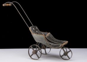 A 19th century three-wheeled dolls’ pushchair,