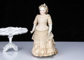 A French fixed shoulder-head fashionable doll with painted eyes,
