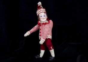 An unusual French bisque headed Mr Punch or Pulcinella doll marked H,