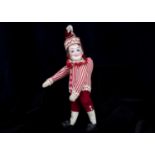 An unusual French bisque headed Mr Punch or Pulcinella doll marked H,