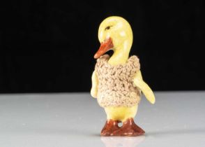 A Hertwig all-bisque dolls’ house duckling girl doll,