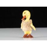 A Hertwig all-bisque dolls’ house duckling girl doll,