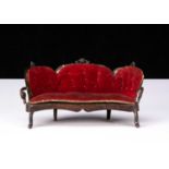 A Rock & Graner tinplate dolls’ house sofa,