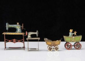 Four German Penny Toy dolls’ house items,