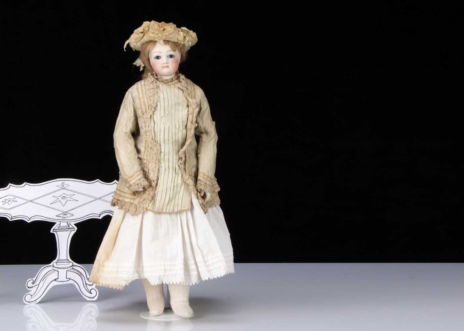 A 19th century French swivel head fashionable doll with jointed body,