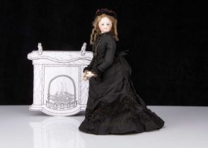 A Jumeau bisque swivel head fashionable doll in mourning dress,