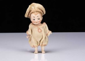 A small German all-bisque googly eyed doll,