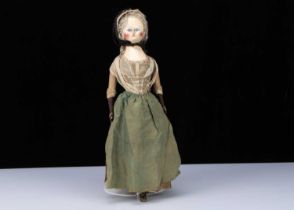 A rare and fine 1780s English wooden doll,