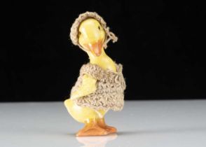 A Hertwig all-bisque dolls’ house duckling girl doll,