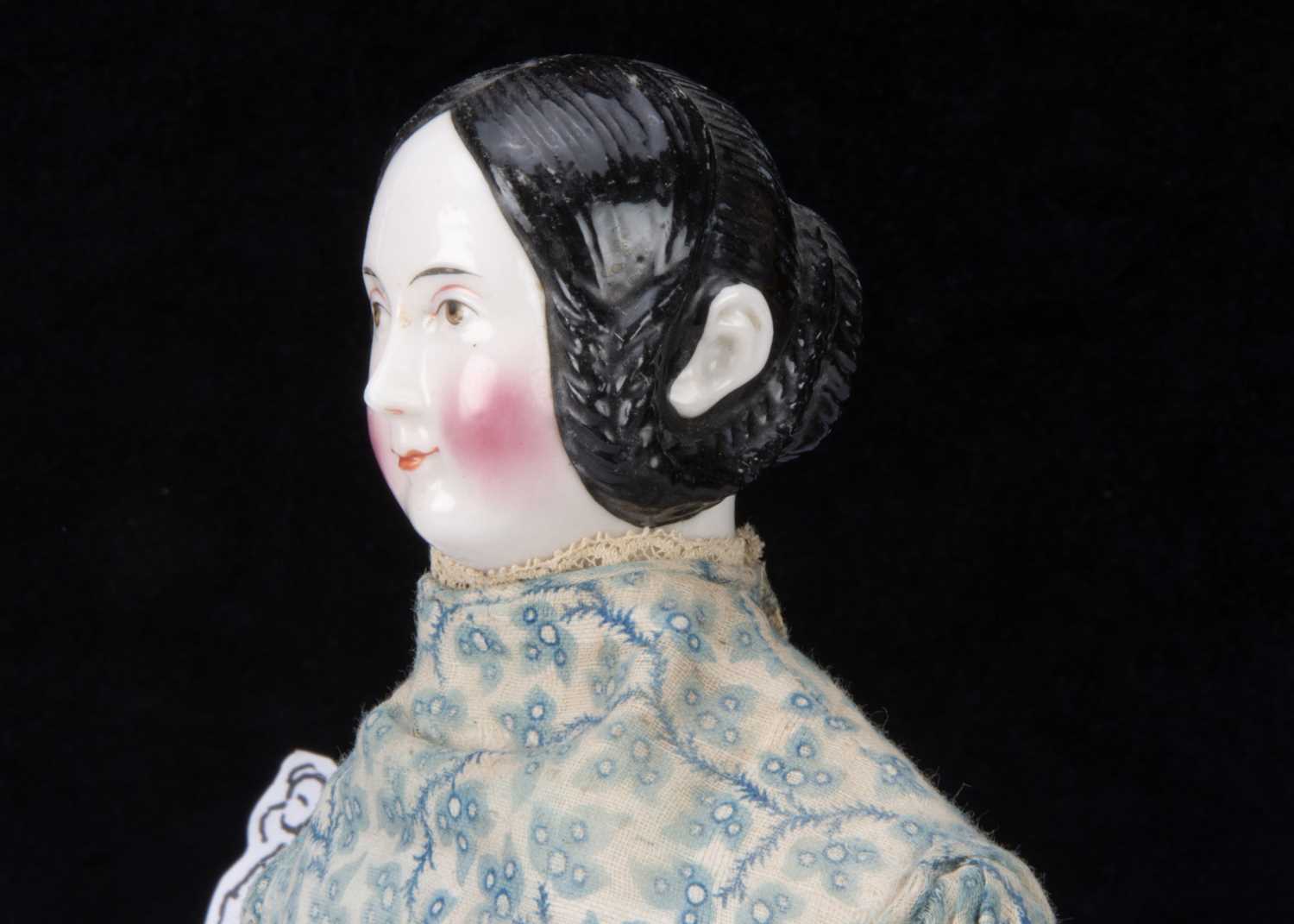 A fine early German china shoulder head doll with Queen Victoria exposed ear hairstyle, - Image 4 of 5